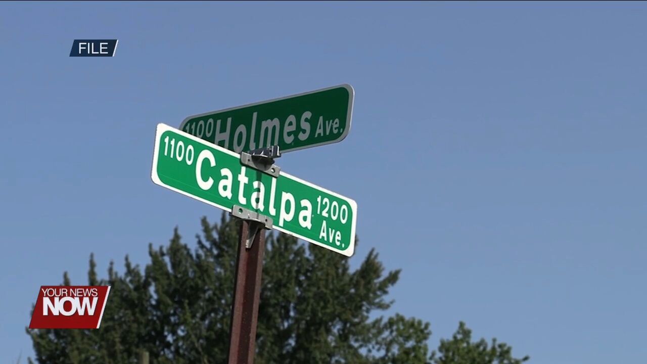 Residents and city officials discuss the Catalpa and Holmes Reconstruction Project